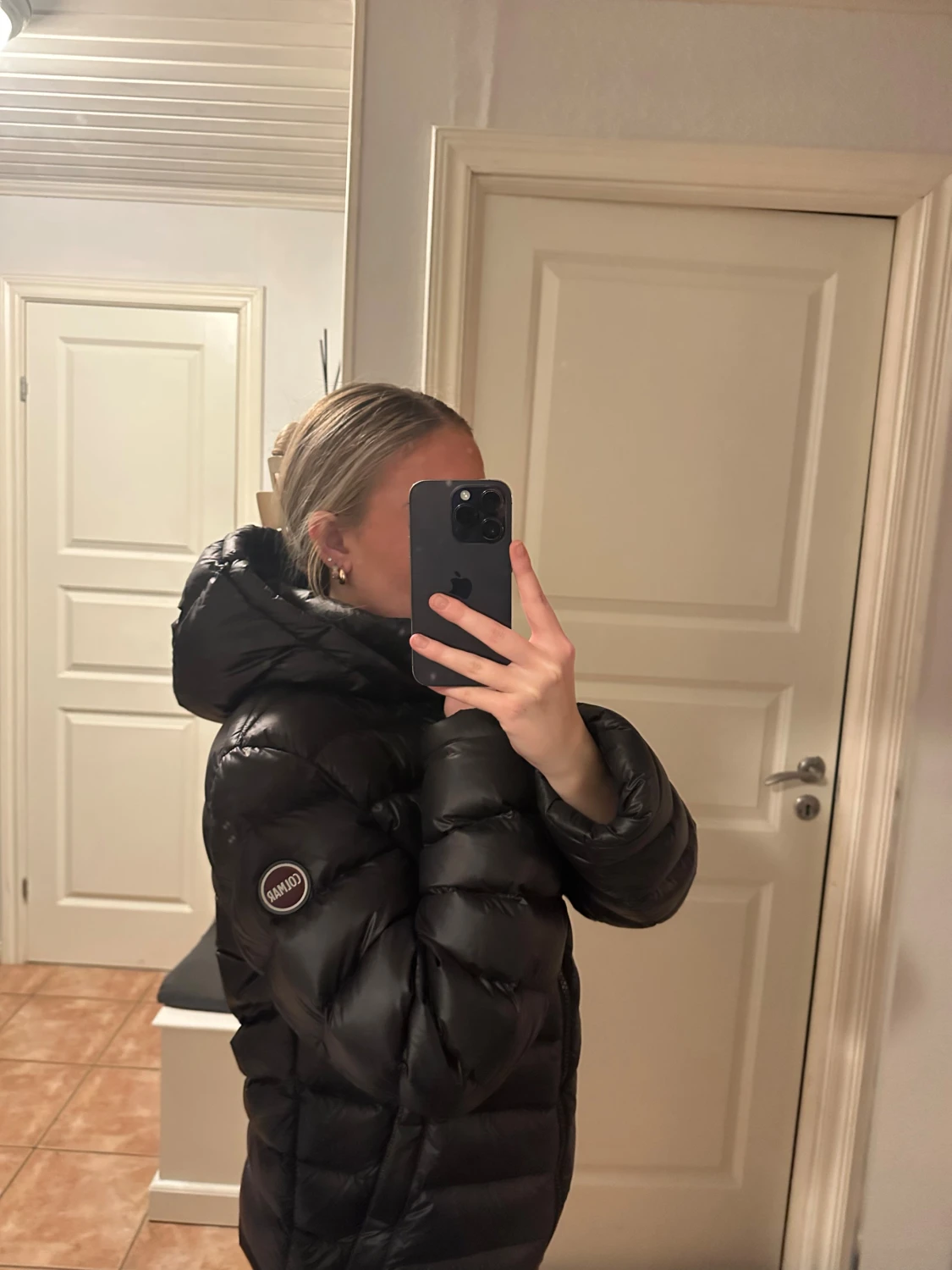 Svart dunjacka från Colmar