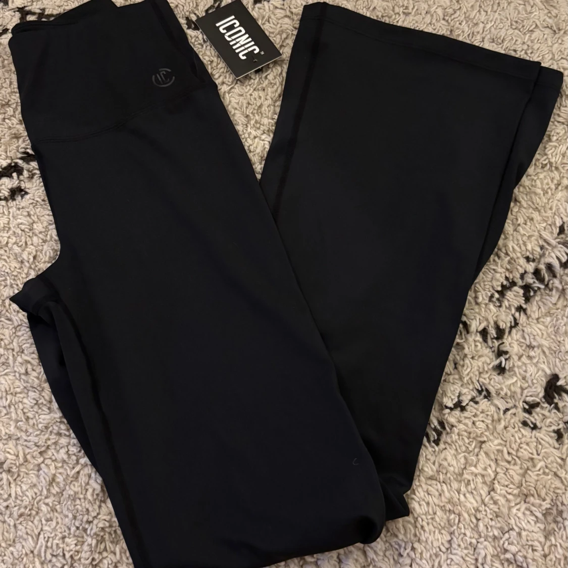 Svarta bootcut tights från Iconic