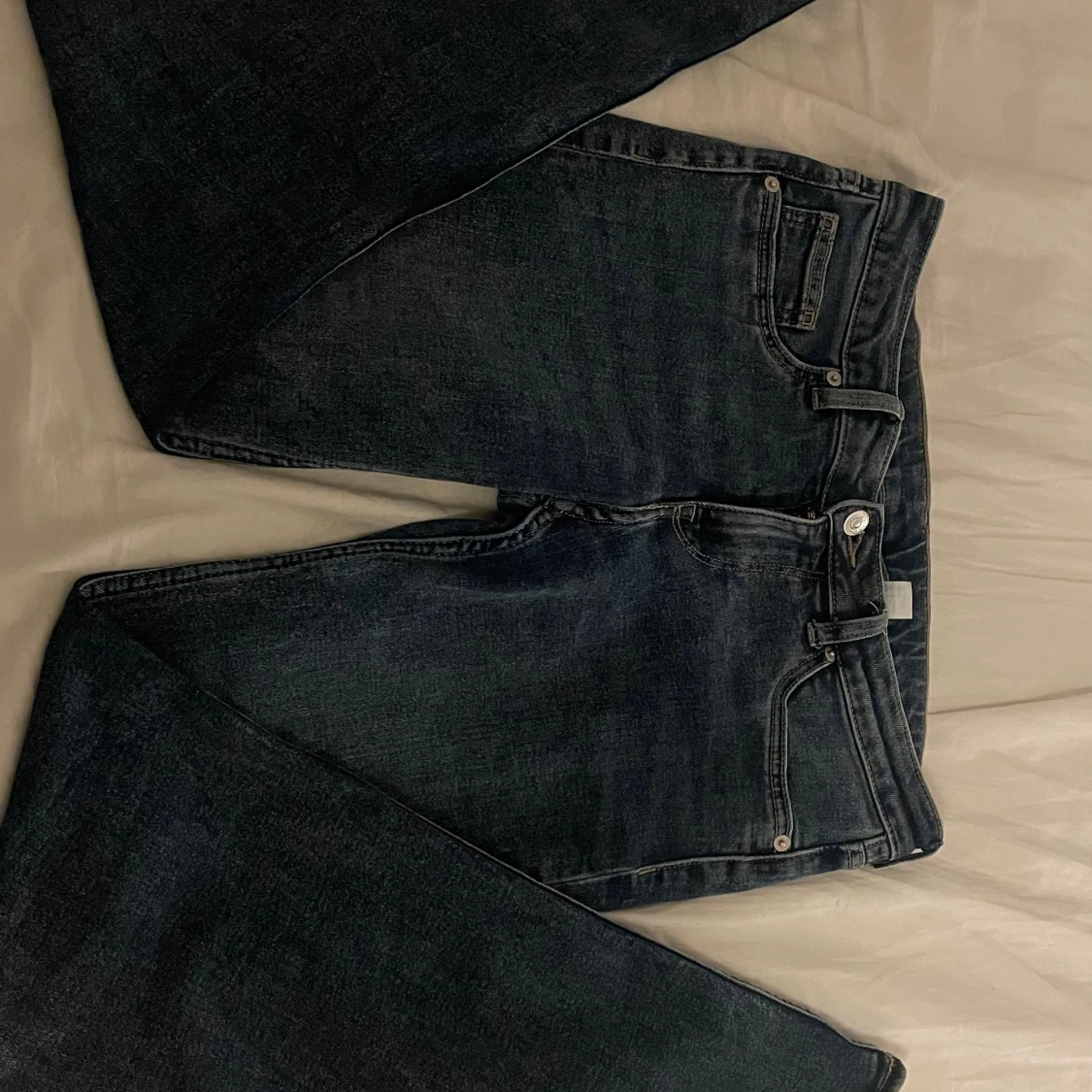 Mörkblå lågmidjade bootcut jeans
