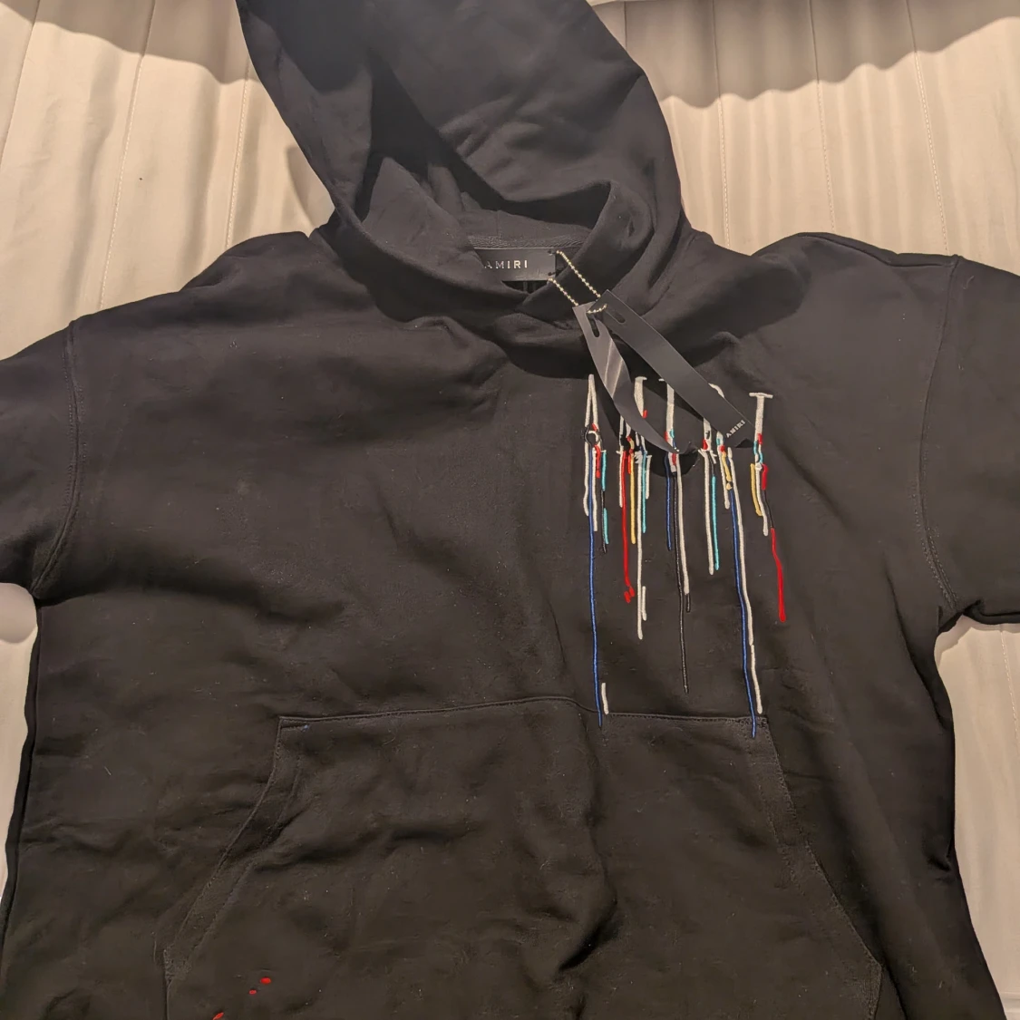 Svart hoodie från Amiri med brodyr