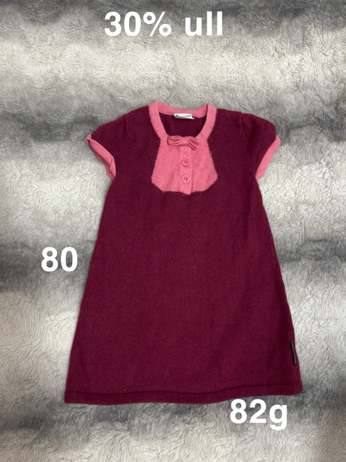 Vinröd ullklänning med rosett
