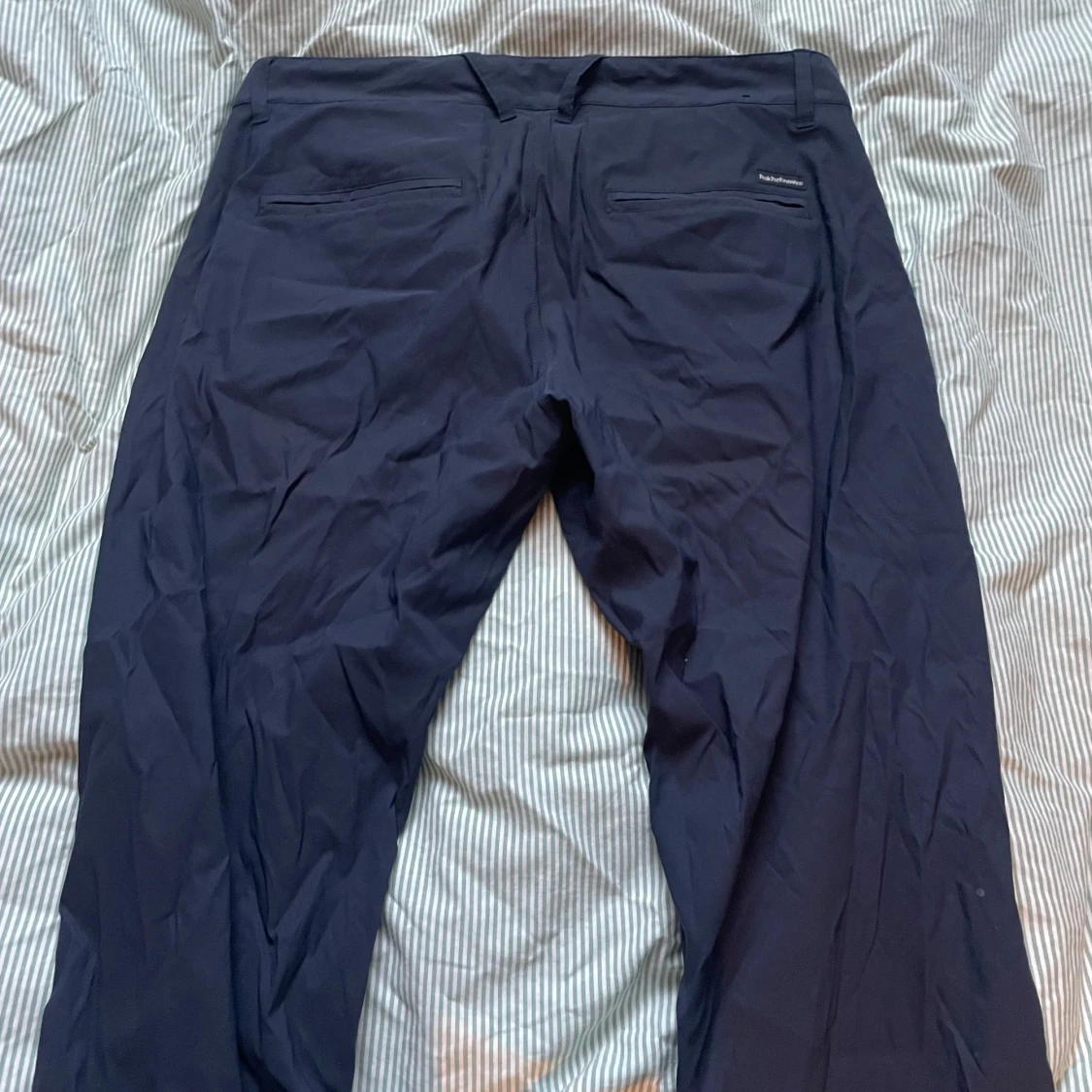 Mörkblå golfbyxor Peak Performance - 1