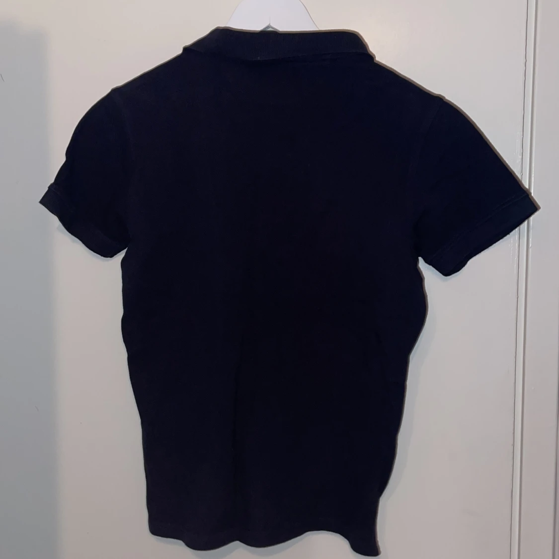 Mörkblå pikétröja från 157 - 1
