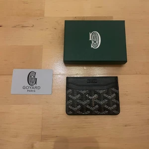 Svart plånbok  - Säljer en svart plånbok 