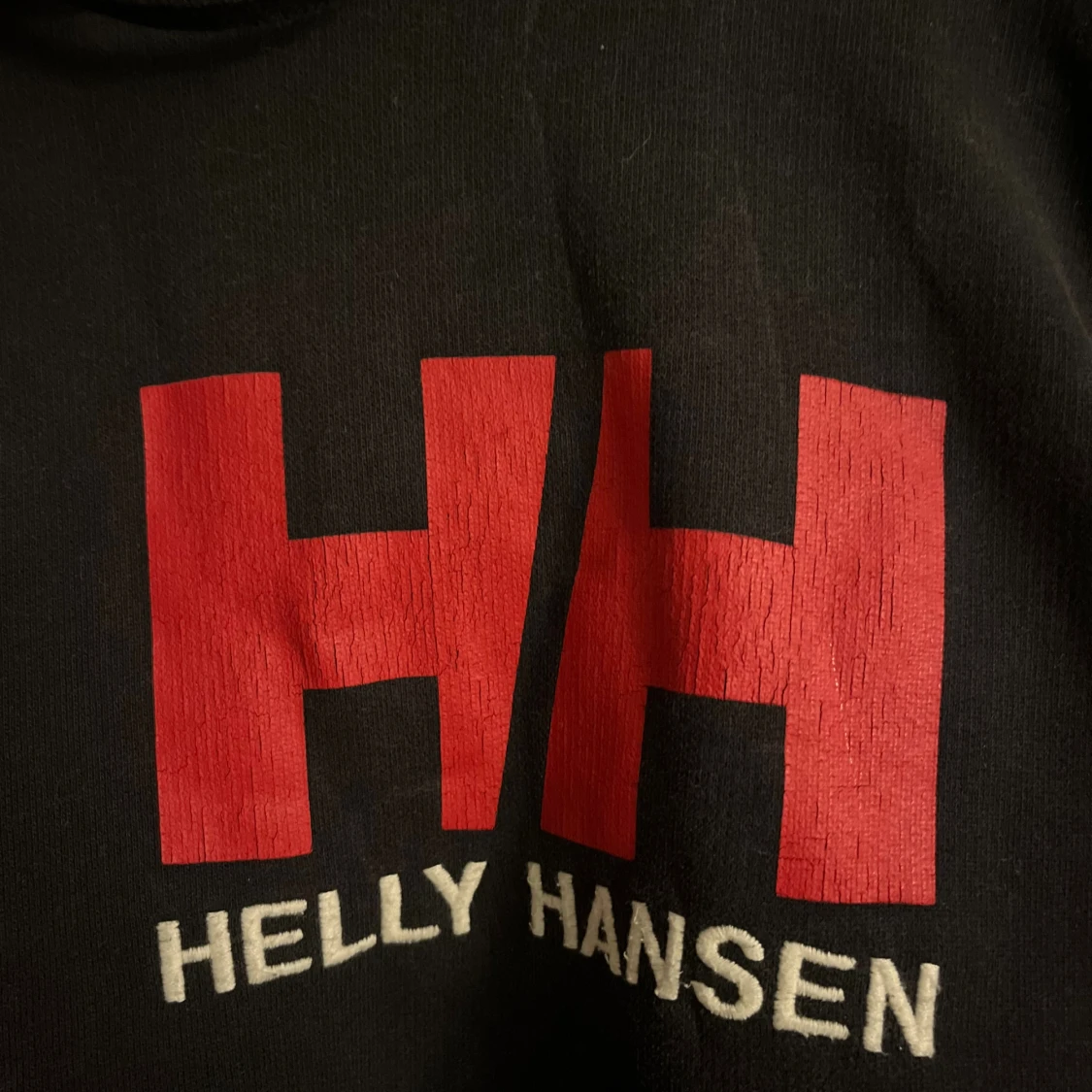 Svart hoodie från Helly Hansen  - 1