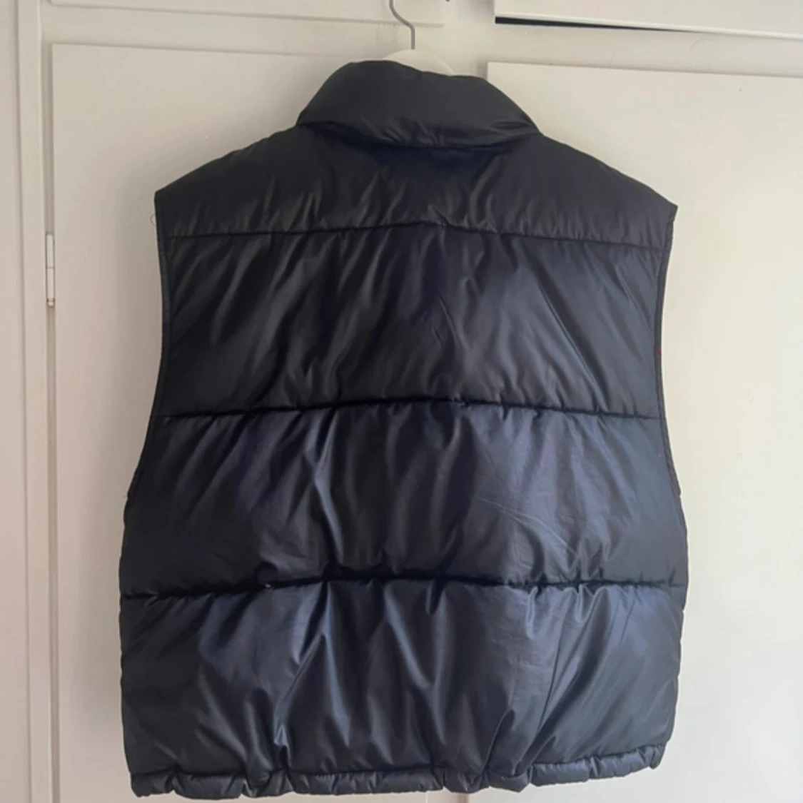 Svart dunväst från H&M XS - 1