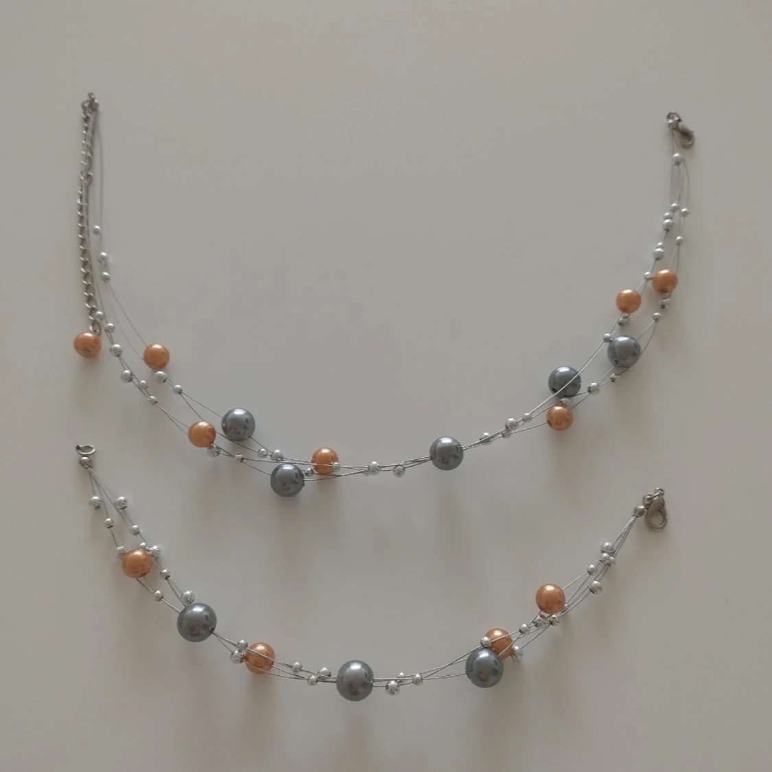 Set med halsband och armband med pärlor - 1