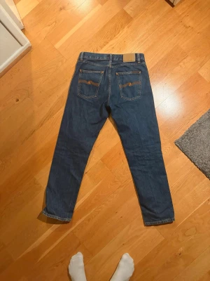 Nudie jeans gritty Jackson  - Ett par blåa nudies i modellen Gritty Jackson. Storlek 31:30
