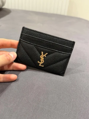 YSL black cardholder gold logo - Like brand new. Bought on Vinted with item verification and came out as 100% real. Please send your offers!