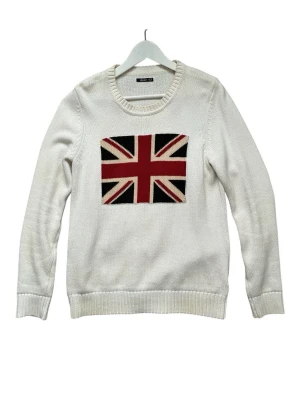 Stickad tröja London flag - Stickad tröja från Crocker med en Union Jack flagga. Rund hals och ribbade muddar. Storlek L men sitter mer som en M. Använd – lite fläckig vid muddarna och runt halsringningen 