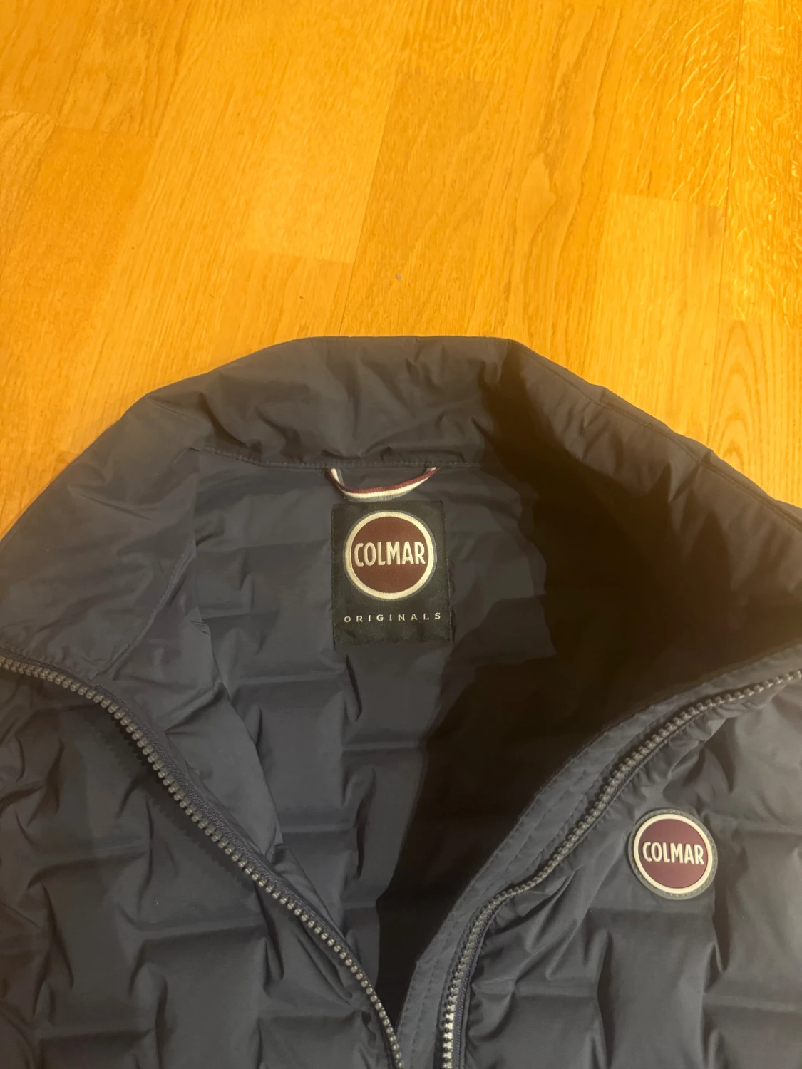 Mörkblå quiltad dunväst från Colmar - 1