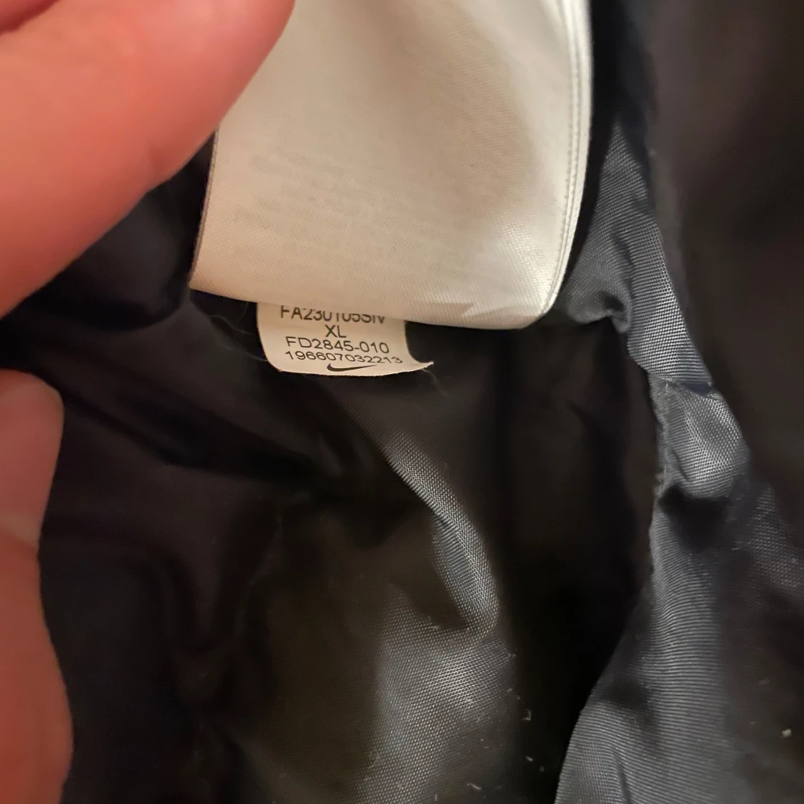 Svart pufferjacka från Nike XL dam - 4