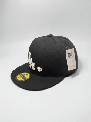 Svart LA 59FIFTY keps New Era 7 1/4 57.7 cm  - New Era Los Angeles keps svart 7 1/4 57.7 cm 