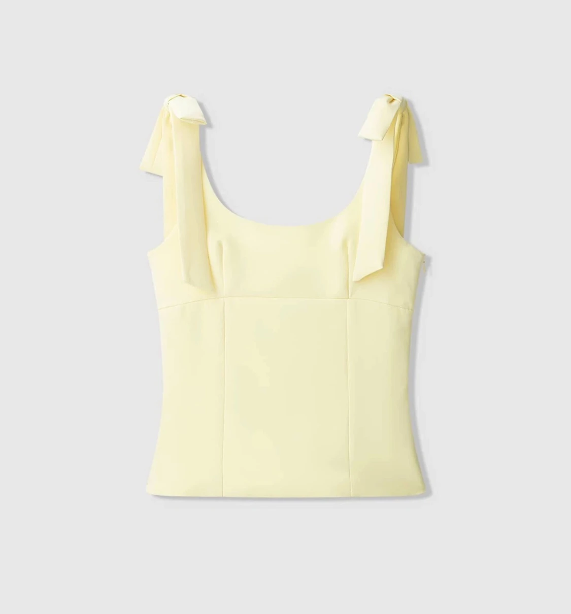 Ljusgul linnetopp med rosetter