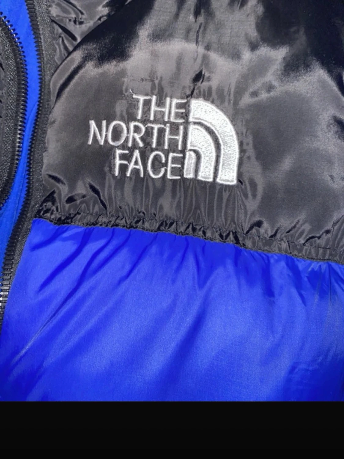 Blå pufferjacka från The North Face - 1