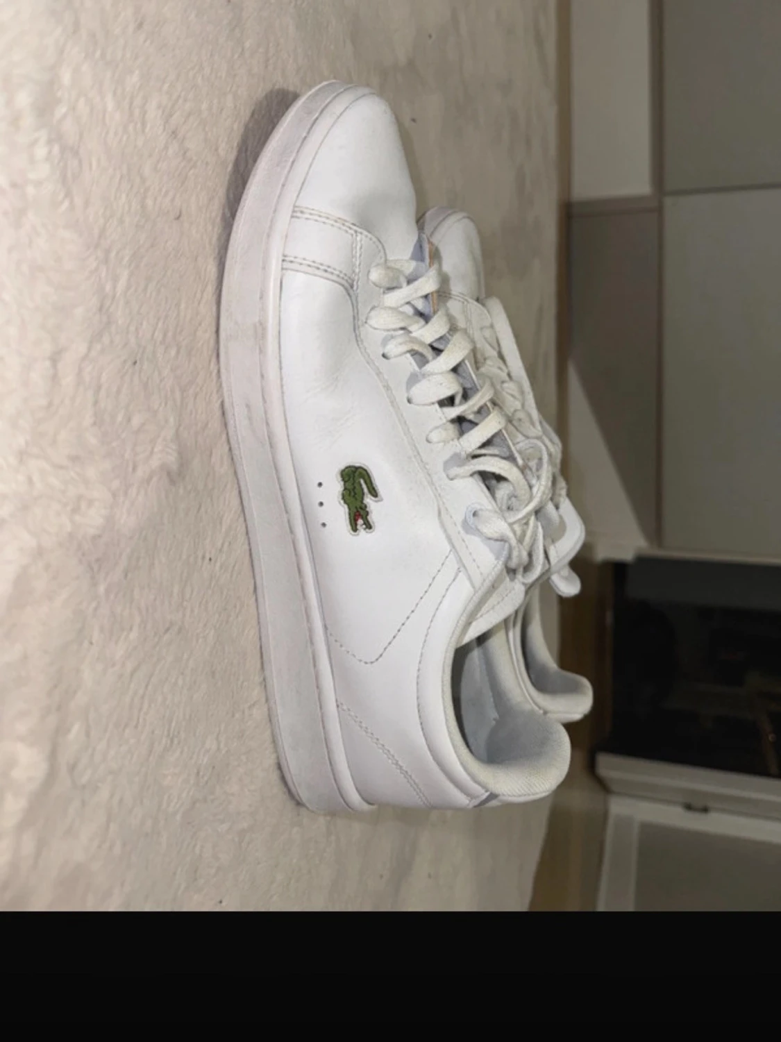 Vita sneakers från Lacoste i skinn