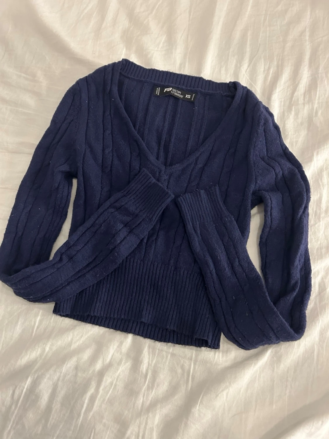 Marinblå stickad kofta från FB Sister