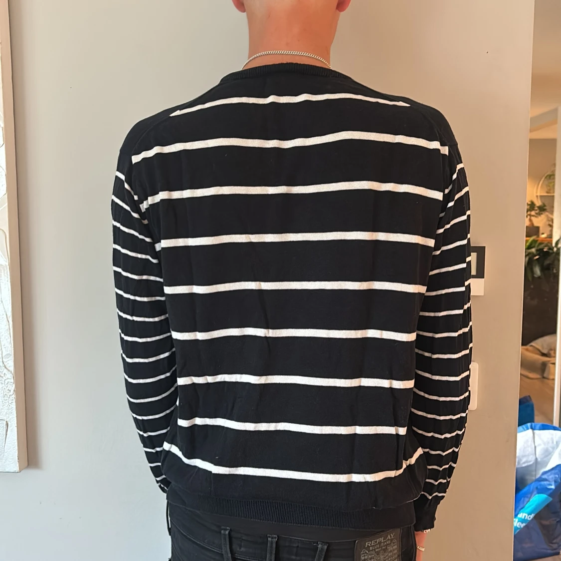 Randig svart tröja från Lacoste - 1