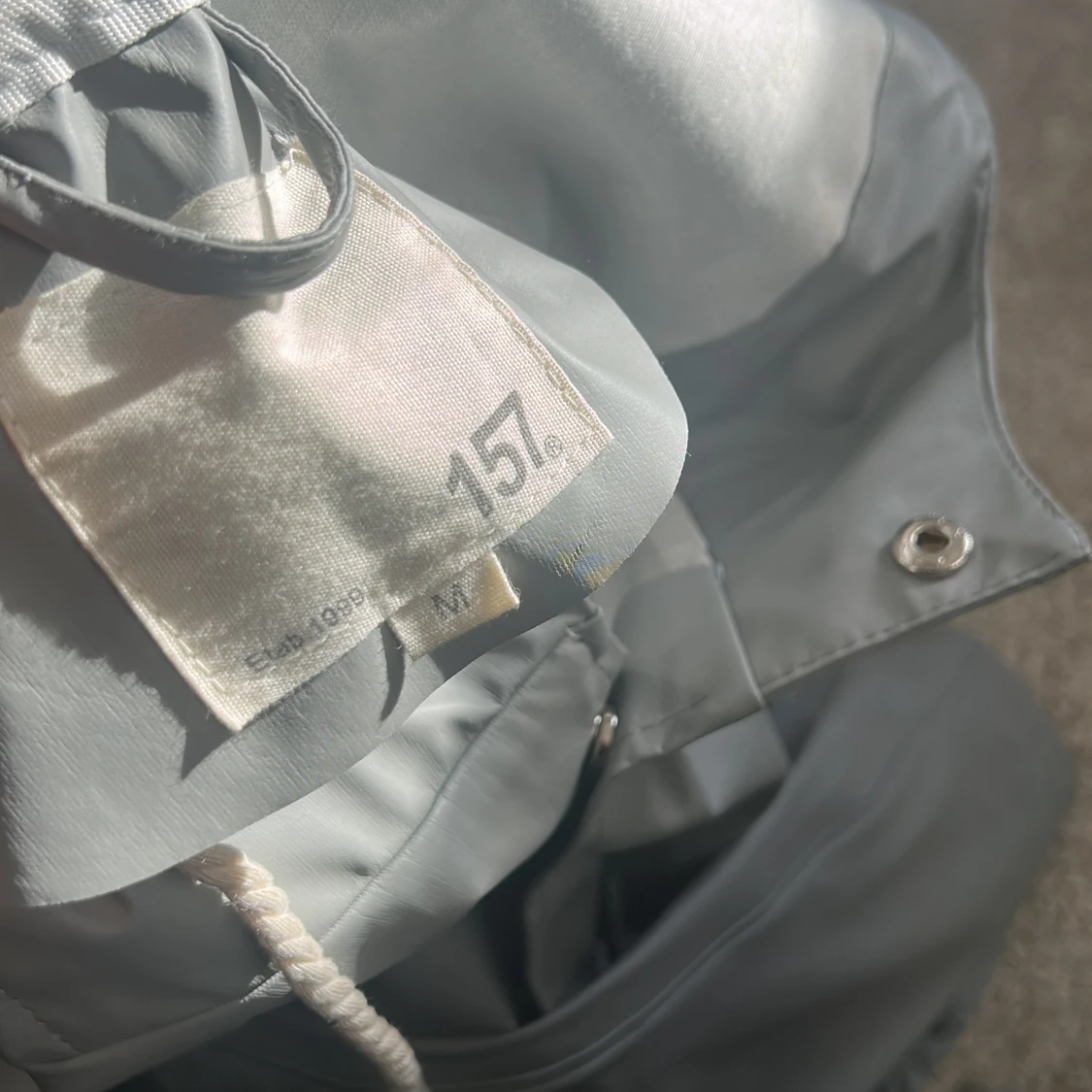 Grå regnjacka med huva från 157 - 2