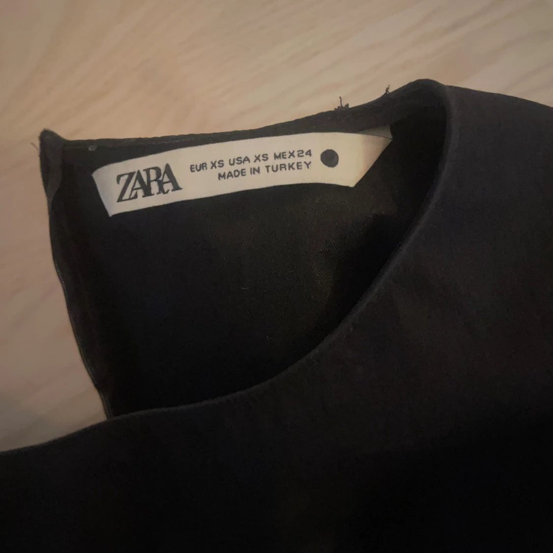 Svart peplumtopp med trekvartsärm - 4