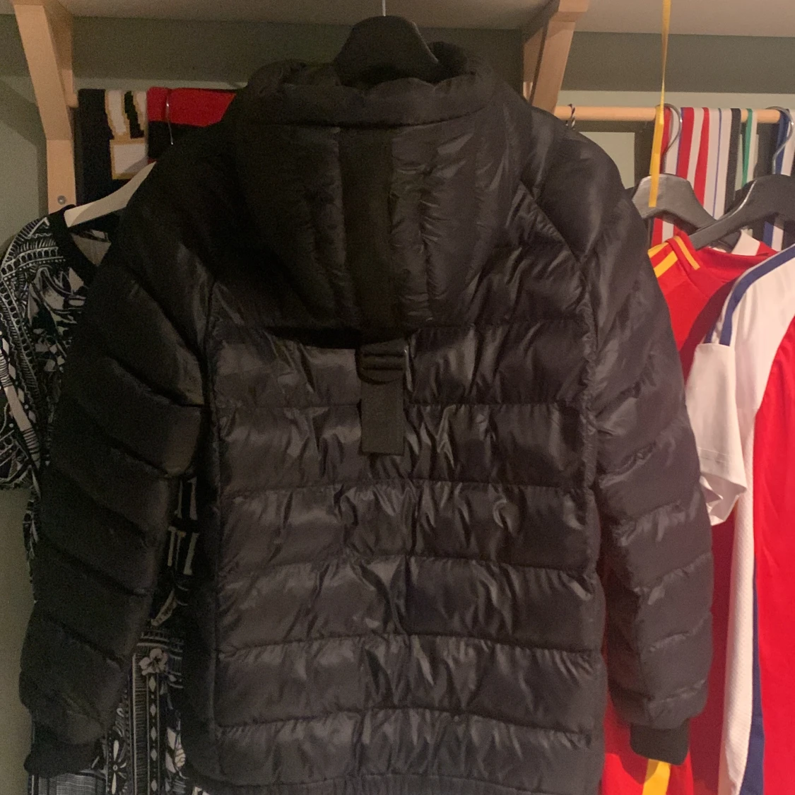 Svart dunjacka Peak Performance S - 1