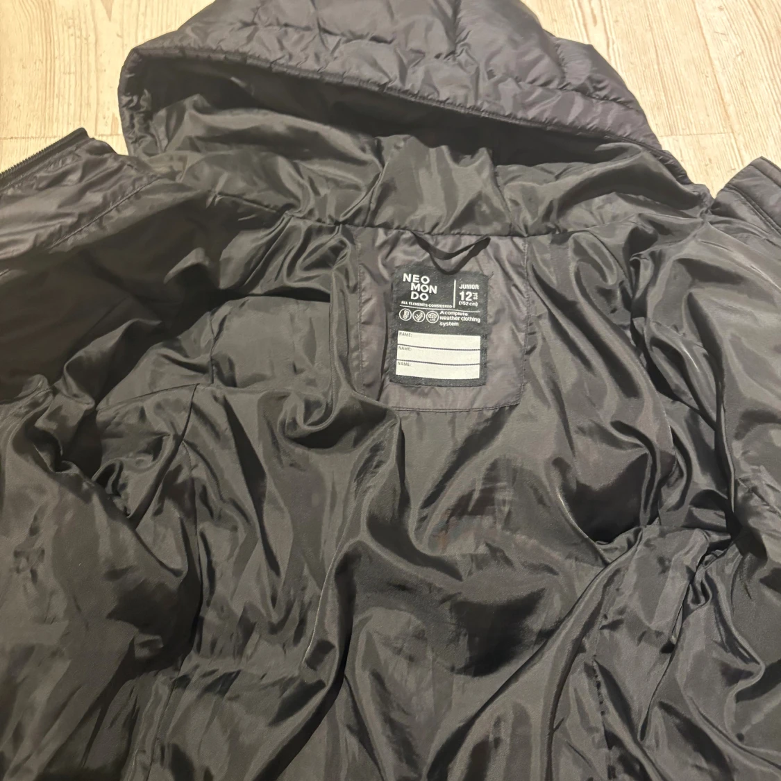 Svart lång dunjacka från Neomondo - 2