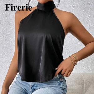 Svart halterneck linnetopp i satin - Säljer nu min super snygga tröja med knyte runt halsen! Tröjan har bara använts en gång💕