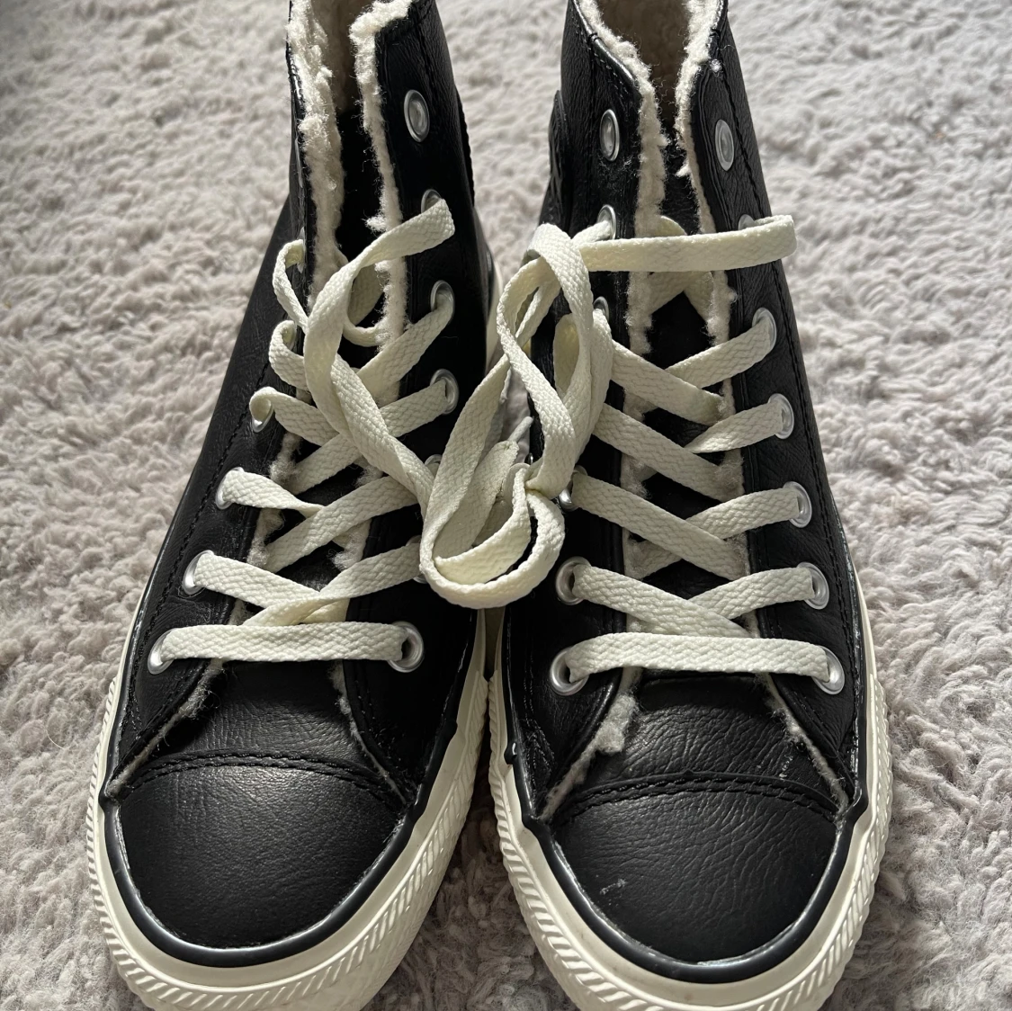 Svarta Converse All Star med foder
