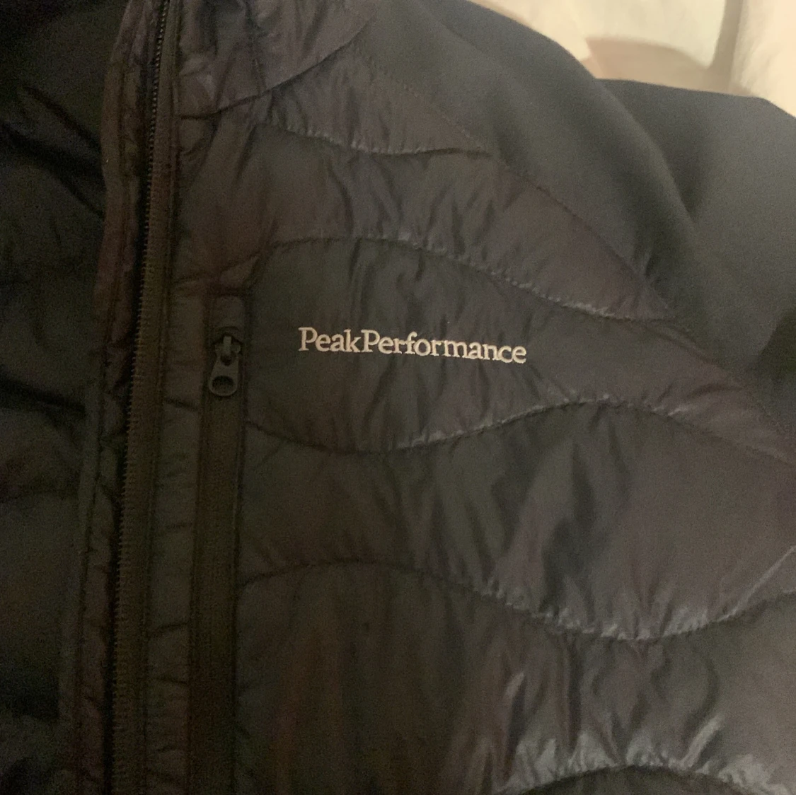 Svart dunjacka Peak Performance L - 1