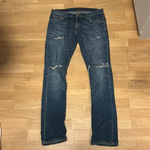 Nudie jeans - Nudie Jeans i modellen Tube Tom storlek 31/32