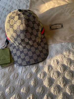 Grå GG Keps - Grå Keps, Storlek M, Möts/Fraktar