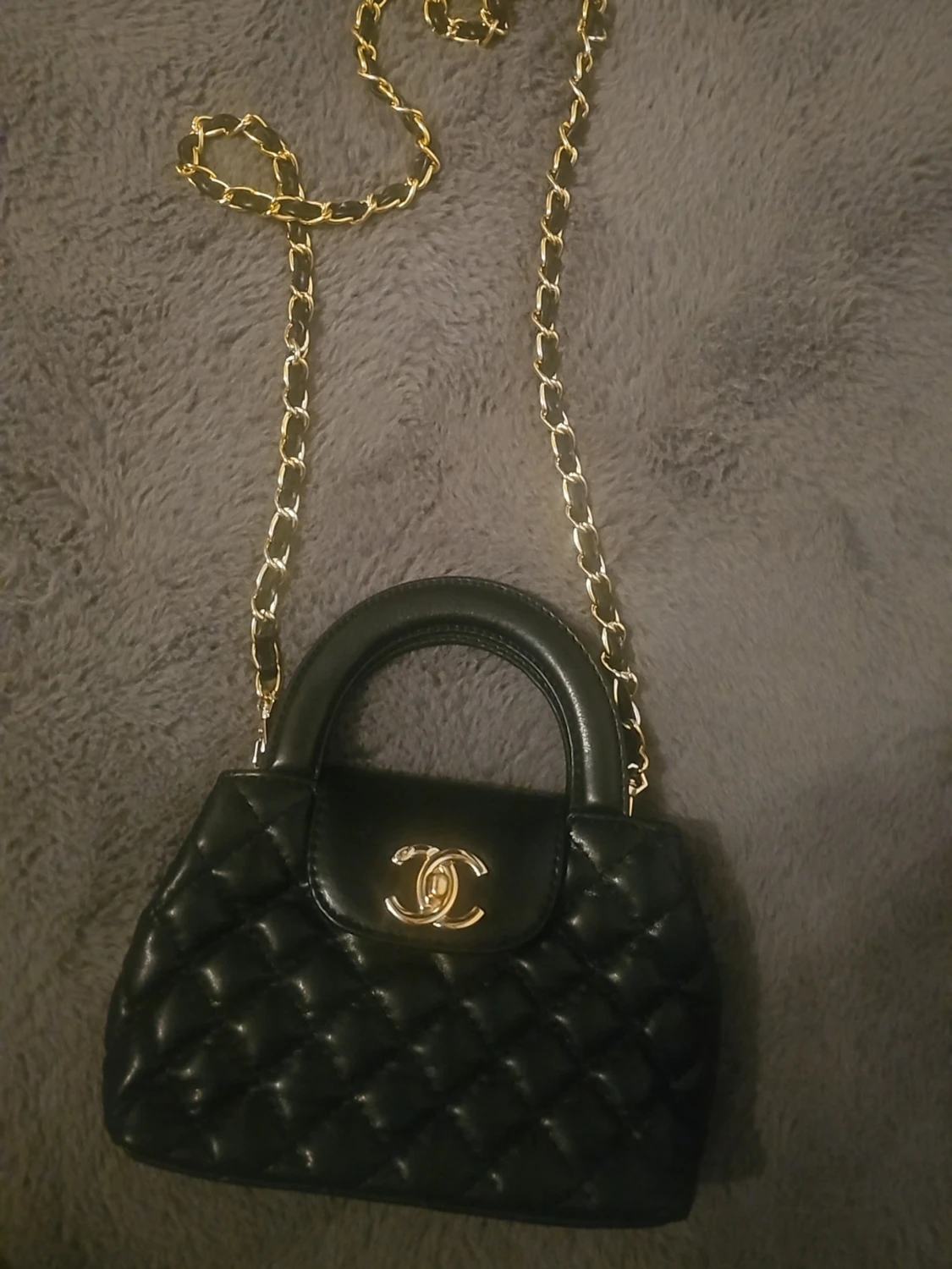 Svart quilted väska