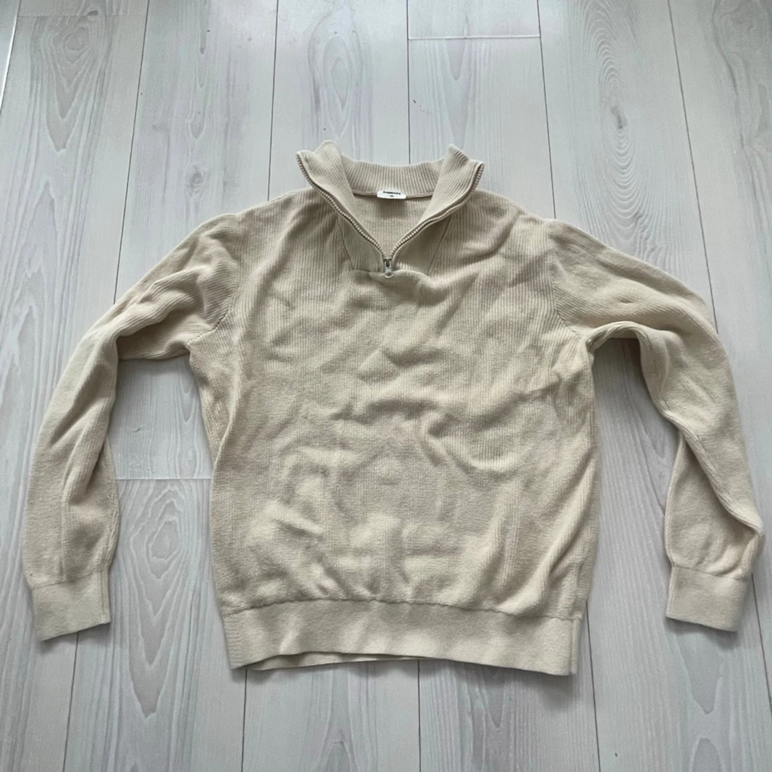 Beige ribbad half zip tröja