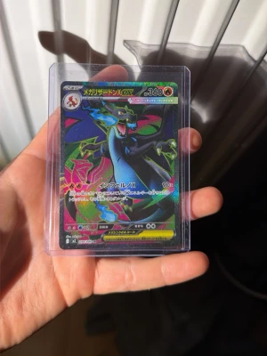 Pokémon kort - Mega charisard X ny sick. Inga repor eller skada på kortet.