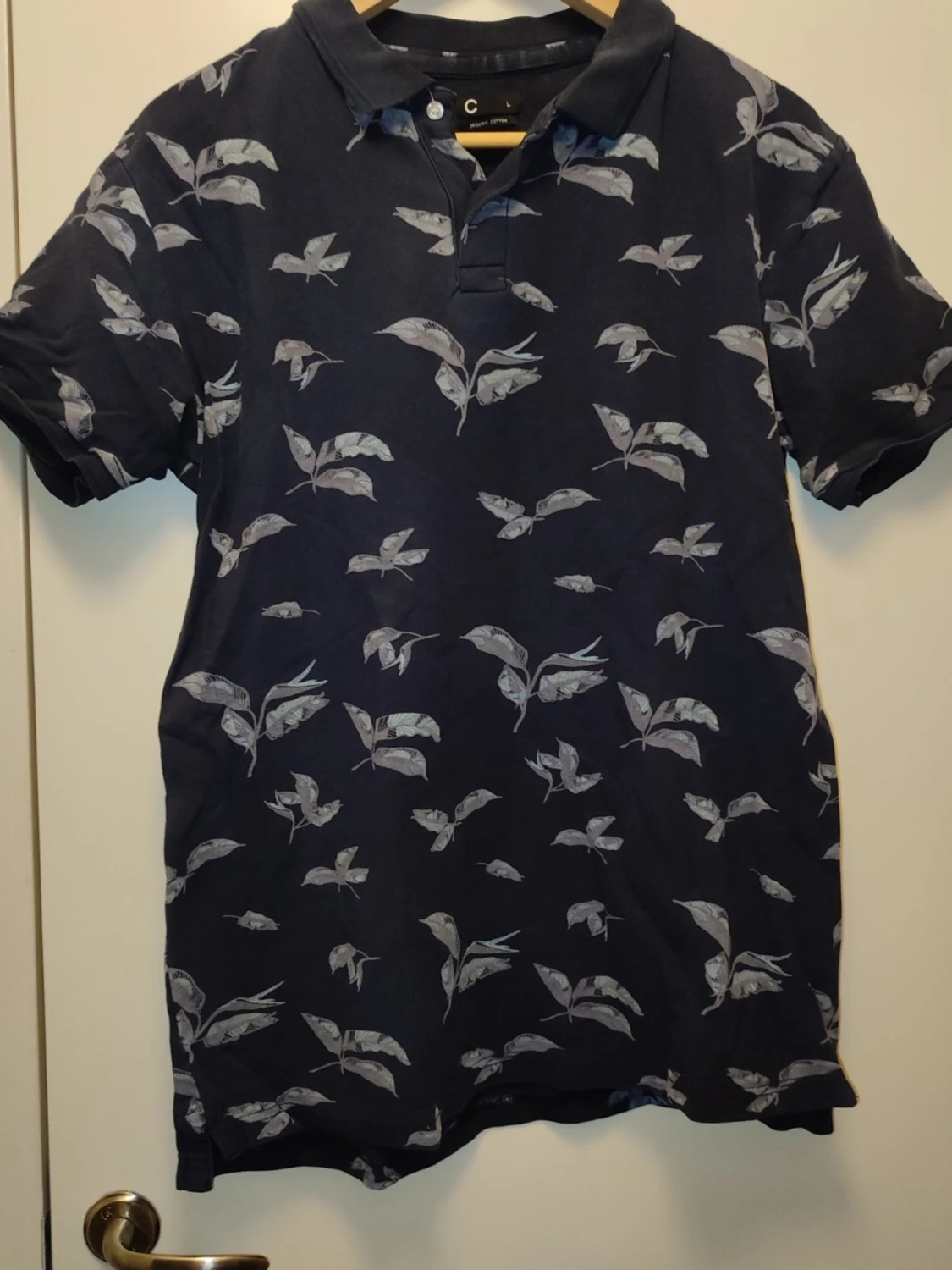 Mörkblå blommig piké från Cubus