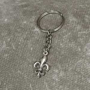Fleur De Lis Silver Nyckelring - Rostfritt stål. 