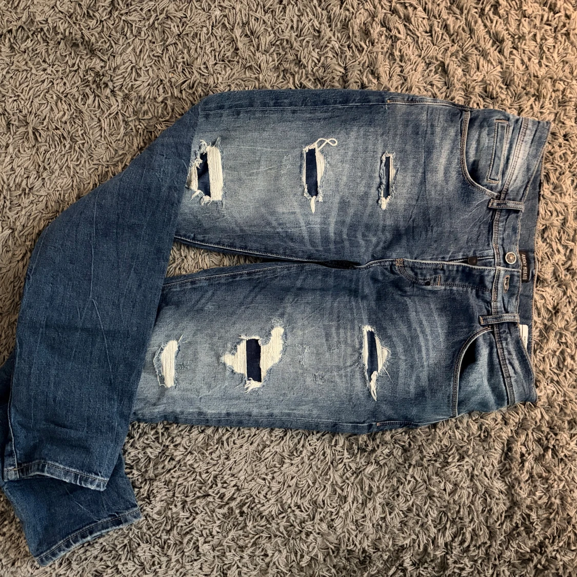 Blå ripped jeans Andy World WATERS