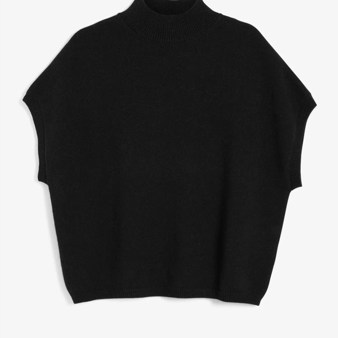 Svart stickad ärmlös tröja