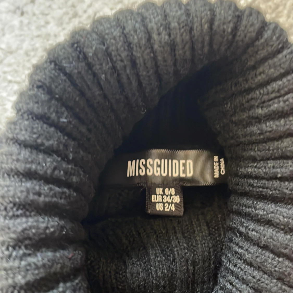 Svart ribbad polotröja från Missguided - 2