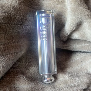 Dior rosa läppstift med glansig hylsa - Ett läppstift från dior har använt lite mindre än halva skriv vid mer frågor 