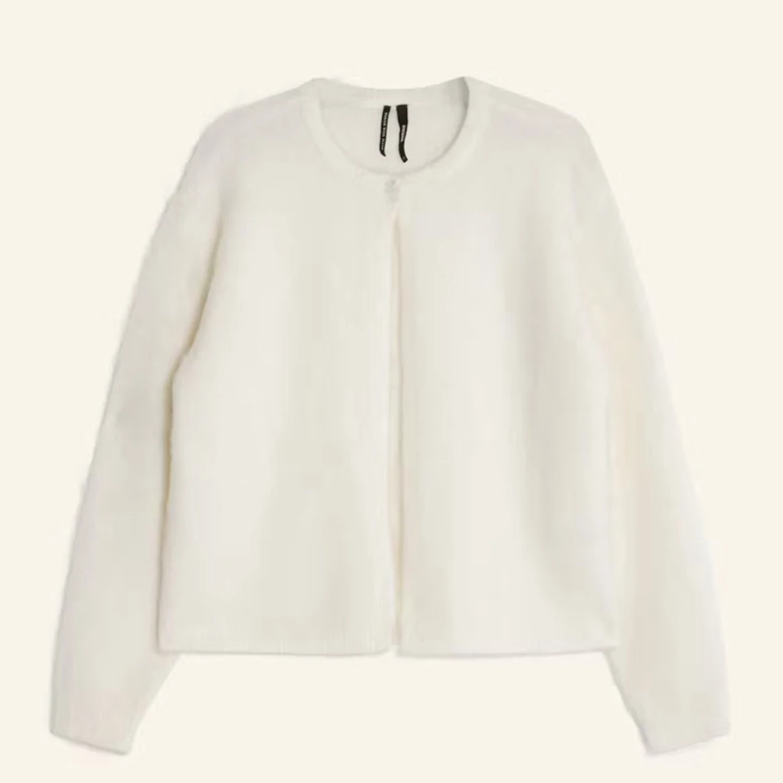 Beige kofta från Gina Tricot XS