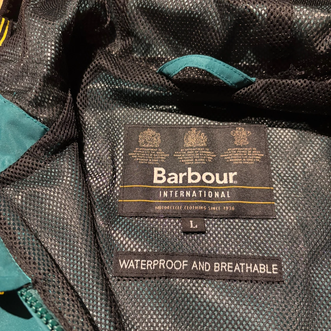 Blågrön regnjacka från Barbour L (stl 150) - 1