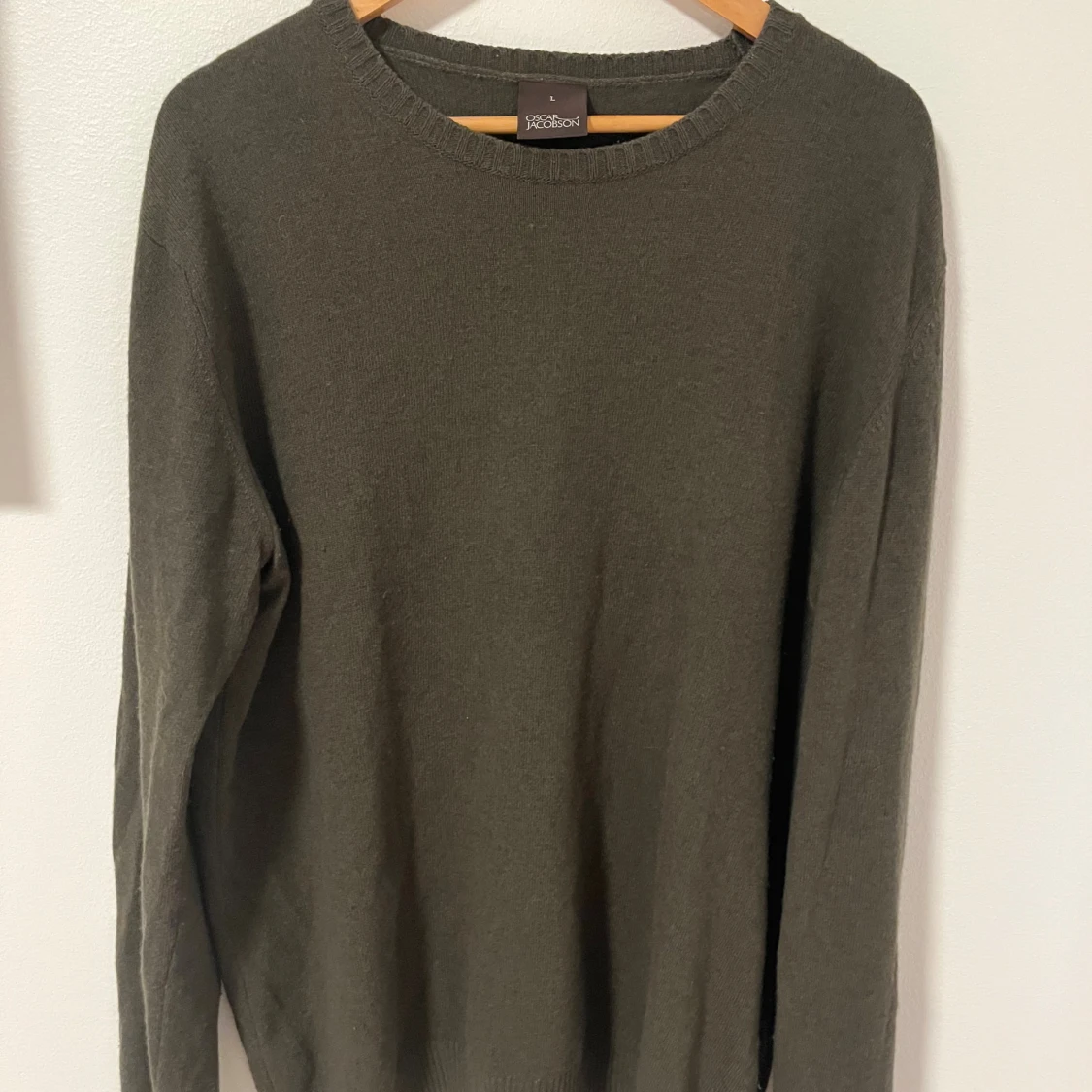 Mörkgrön stickad tröja Oscar Jacobson