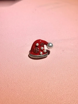 Brosch tomteluva - En julig brosch från guldfynds julkalender 2024. Aldrig använt🎅🏼