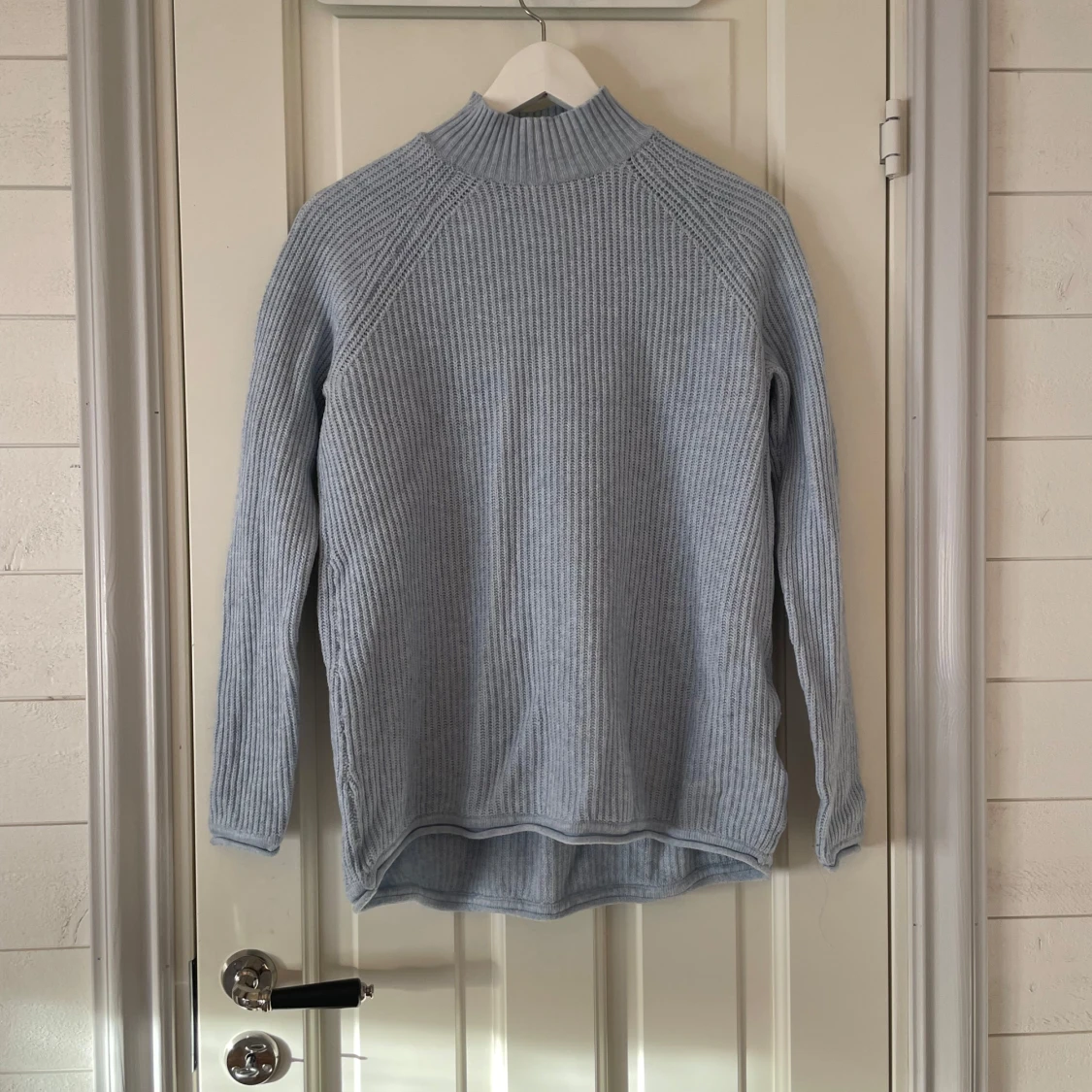 Ljusblå stickad tröja  - 1