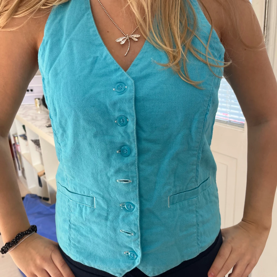 Ljusblå halternecktopp - 90