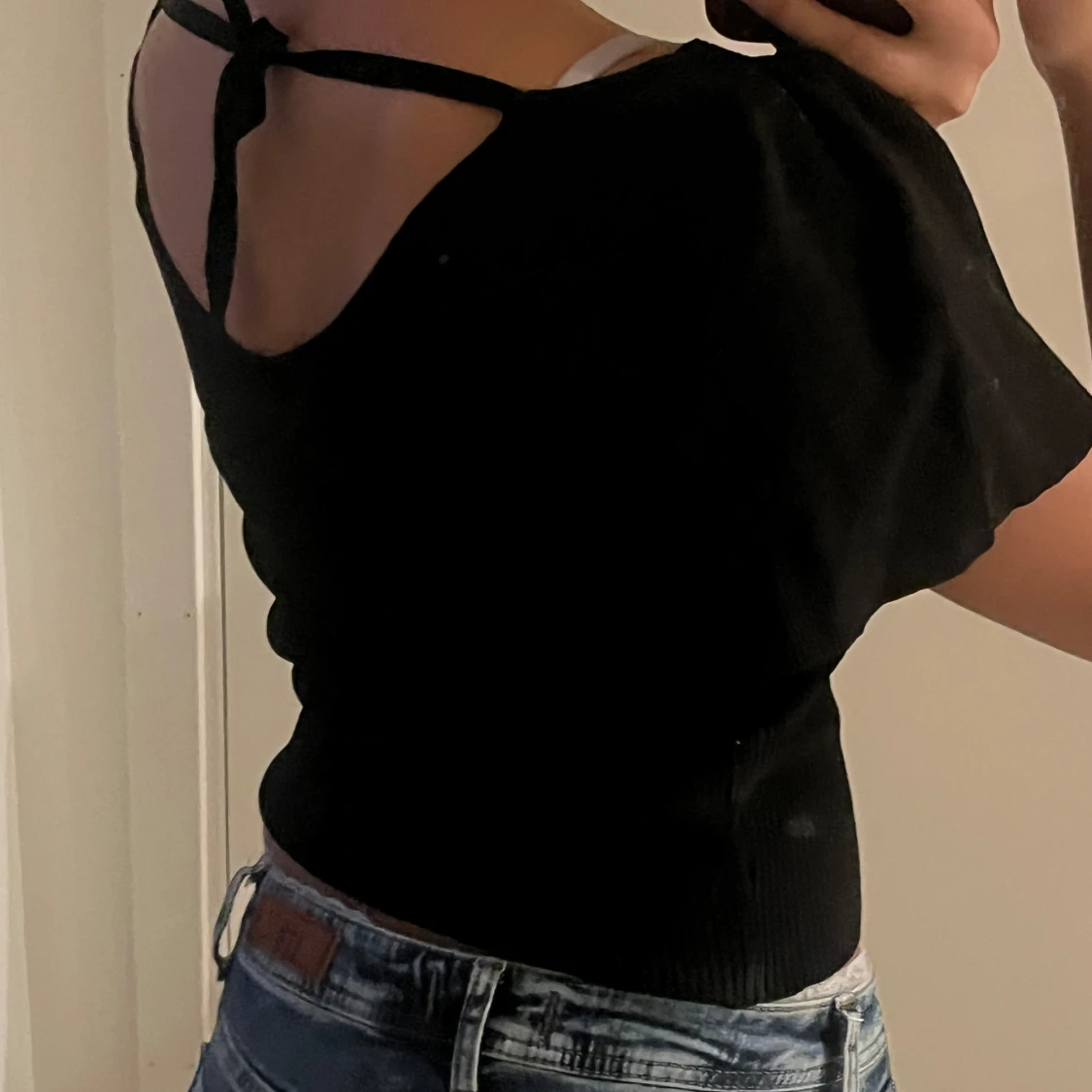 Svart ribbad topp med knyt - 1