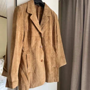 Vintage Manchesterkavaj - Manchesterkavaj från 90-talet i brun färg. 