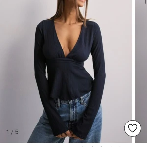 Söt topp från nelly  - Använd en gång och har inga defekter. Säljer då den inte kommer till användning🤍