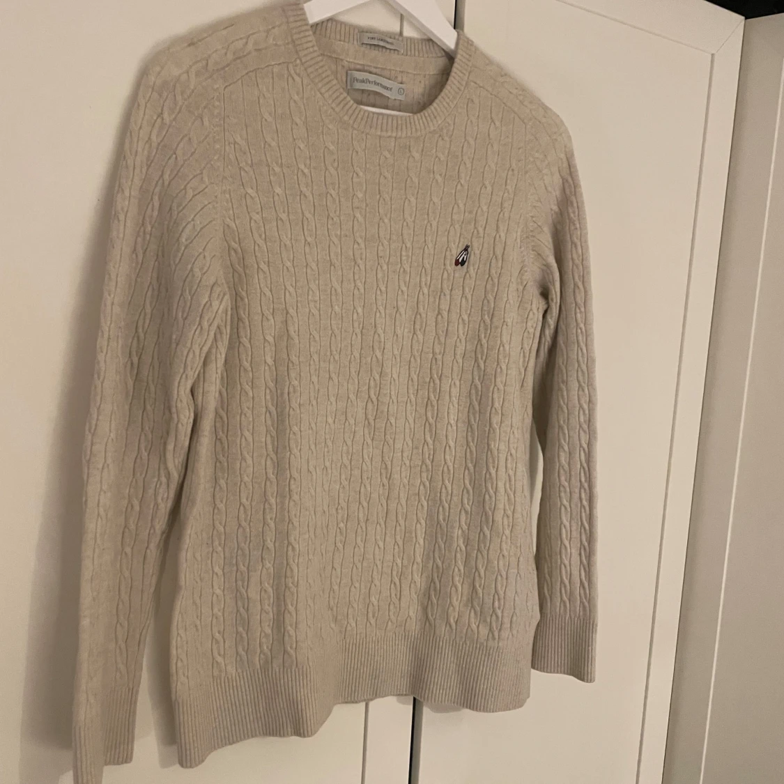 Beige stickad tröja från Peak Performance - 92